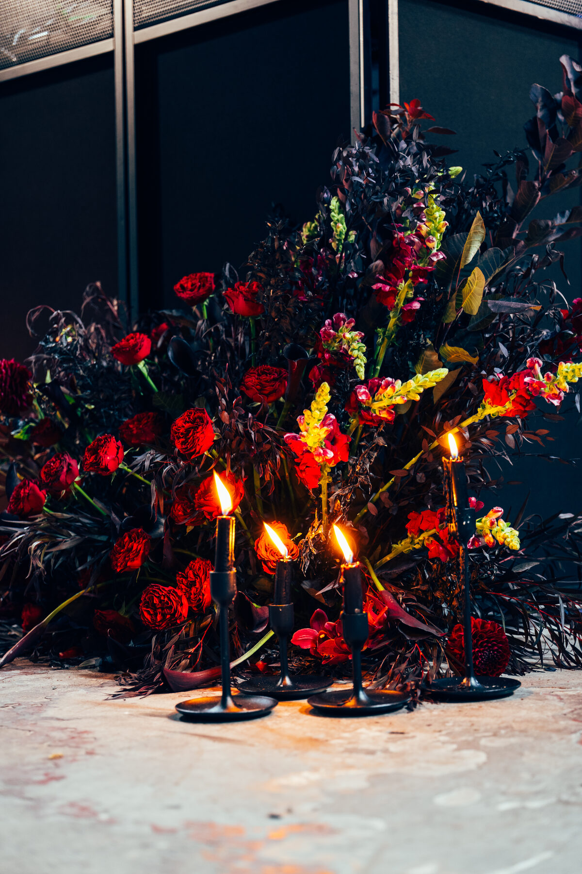 Dark romantic floral wedding arrangement